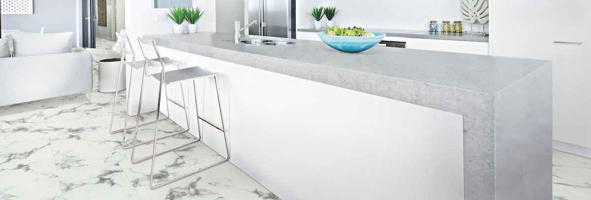 Bright and modern kitchen with white tile flooring